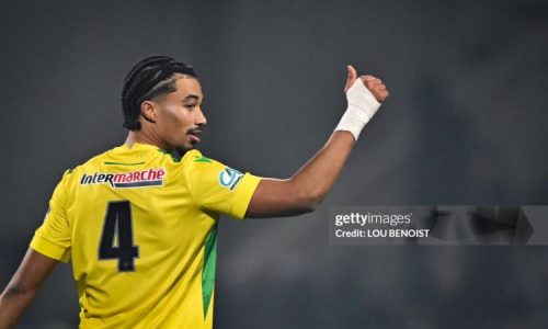 Nantes' French defender #44 Nathan Zeze celebrates after scoring the team's third tryduring the French Cup round of 64 football match between Drancy JA and FC Nantes, at the Bauer Stadium in Saint-Ouen, outside Paris, on December 21, 2024. (Photo by Lou BENOIST / AFP) (Photo by LOU BENOIST/AFP via Getty Images)